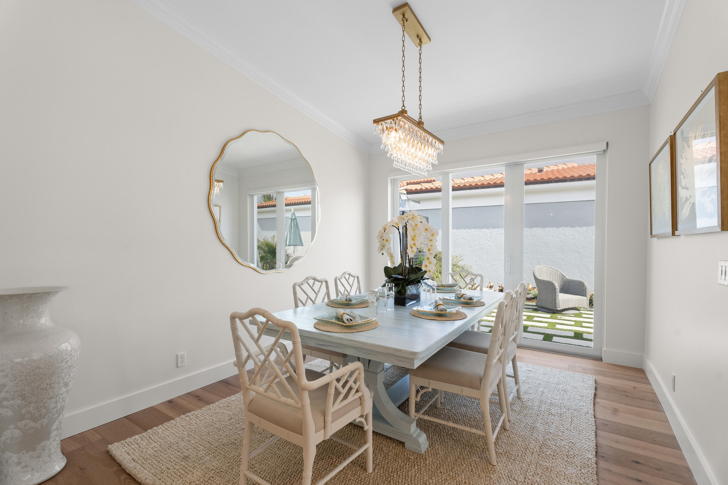 3660 Northwind Court Jupiter, FL 33477 - Photo 17 of 69 a dining room with furniture and wooden floor