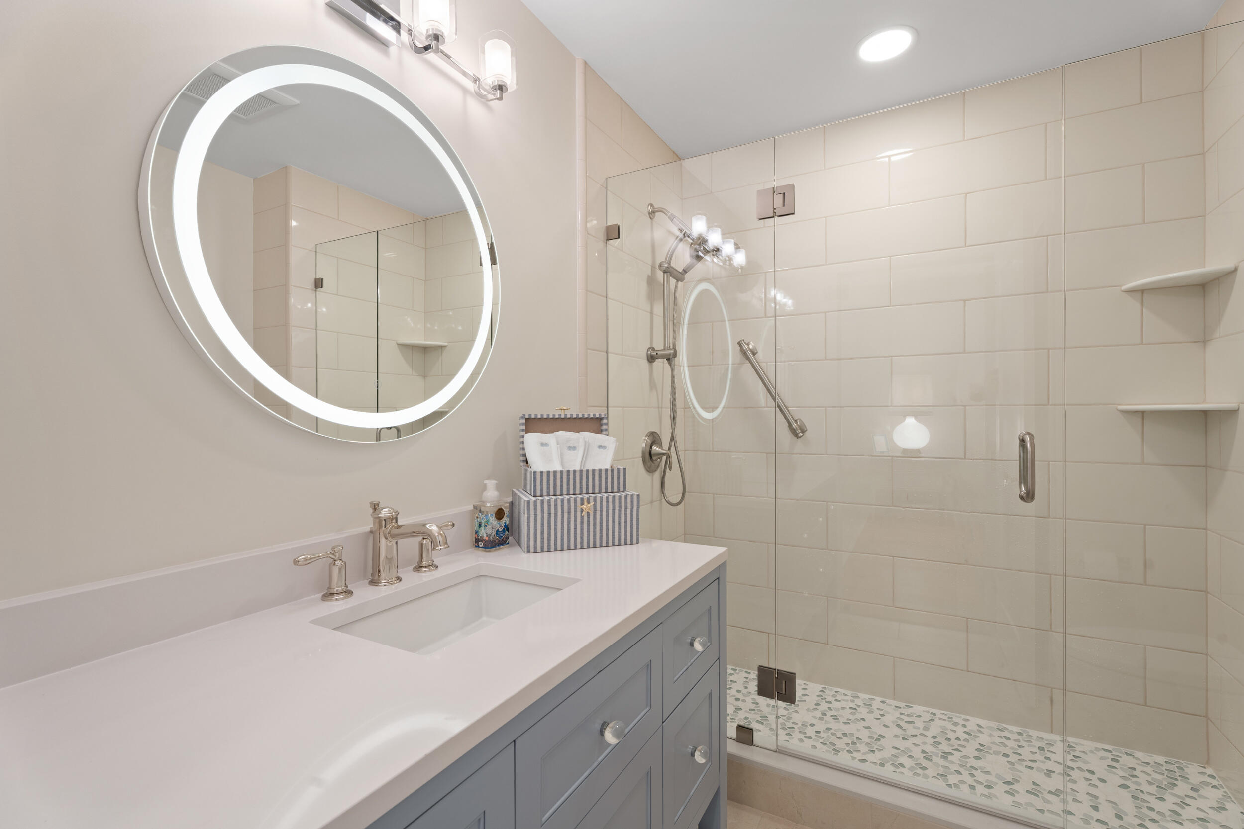 3660 Northwind Court Jupiter, FL 33477 - Photo 35 of 69 a bathroom with a sink a toilet and a mirror