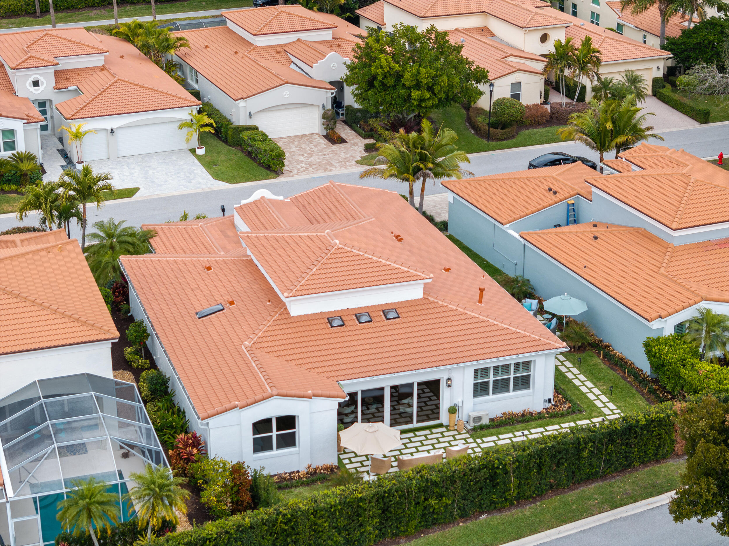 3660 Northwind Court Jupiter, FL 33477 - Photo 47 of 69 an aerial view of multiple houses with yard