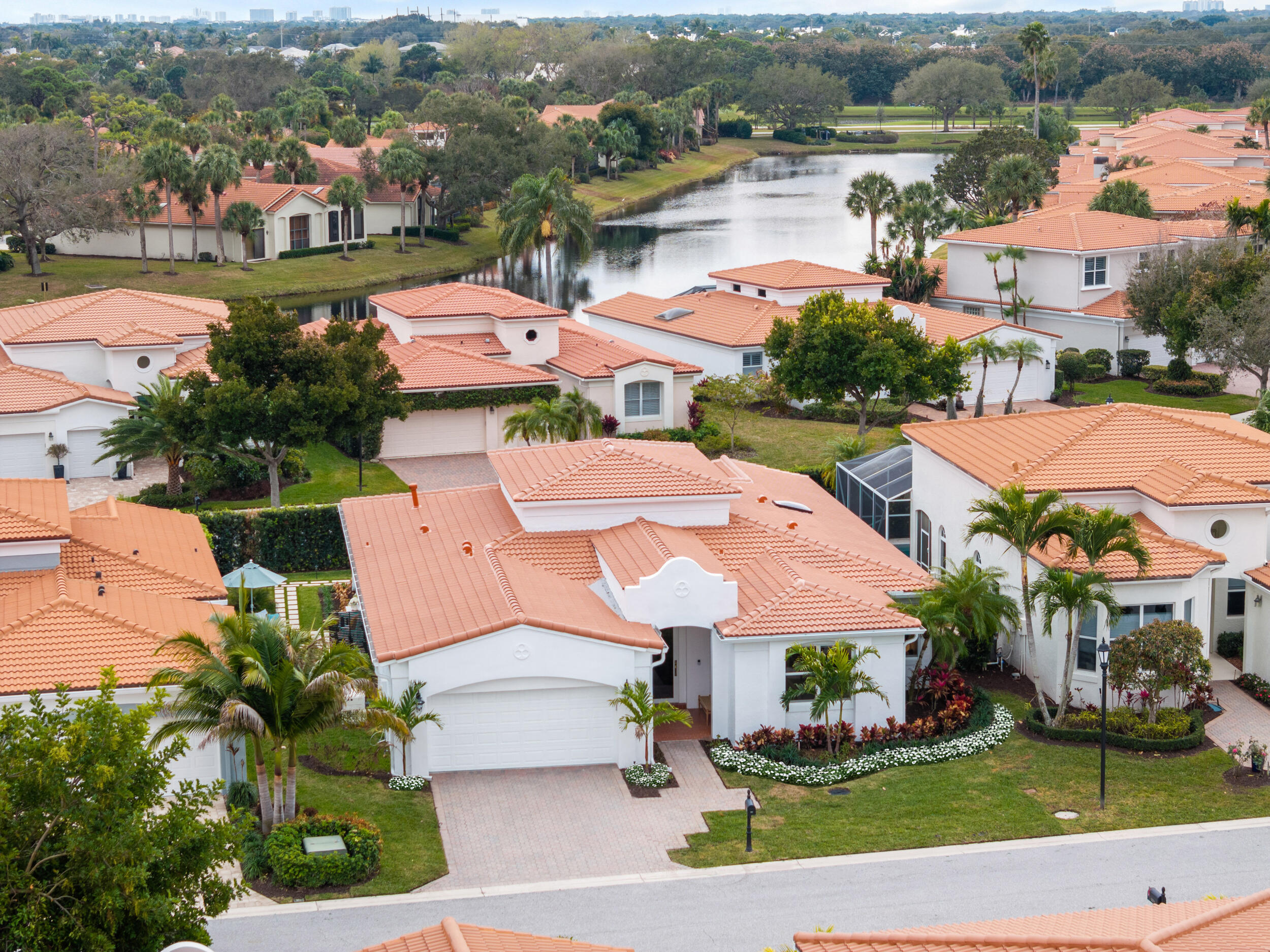 3660 Northwind Court Jupiter, FL 33477 - Photo 48 of 69 an aerial view of a houses with a city street