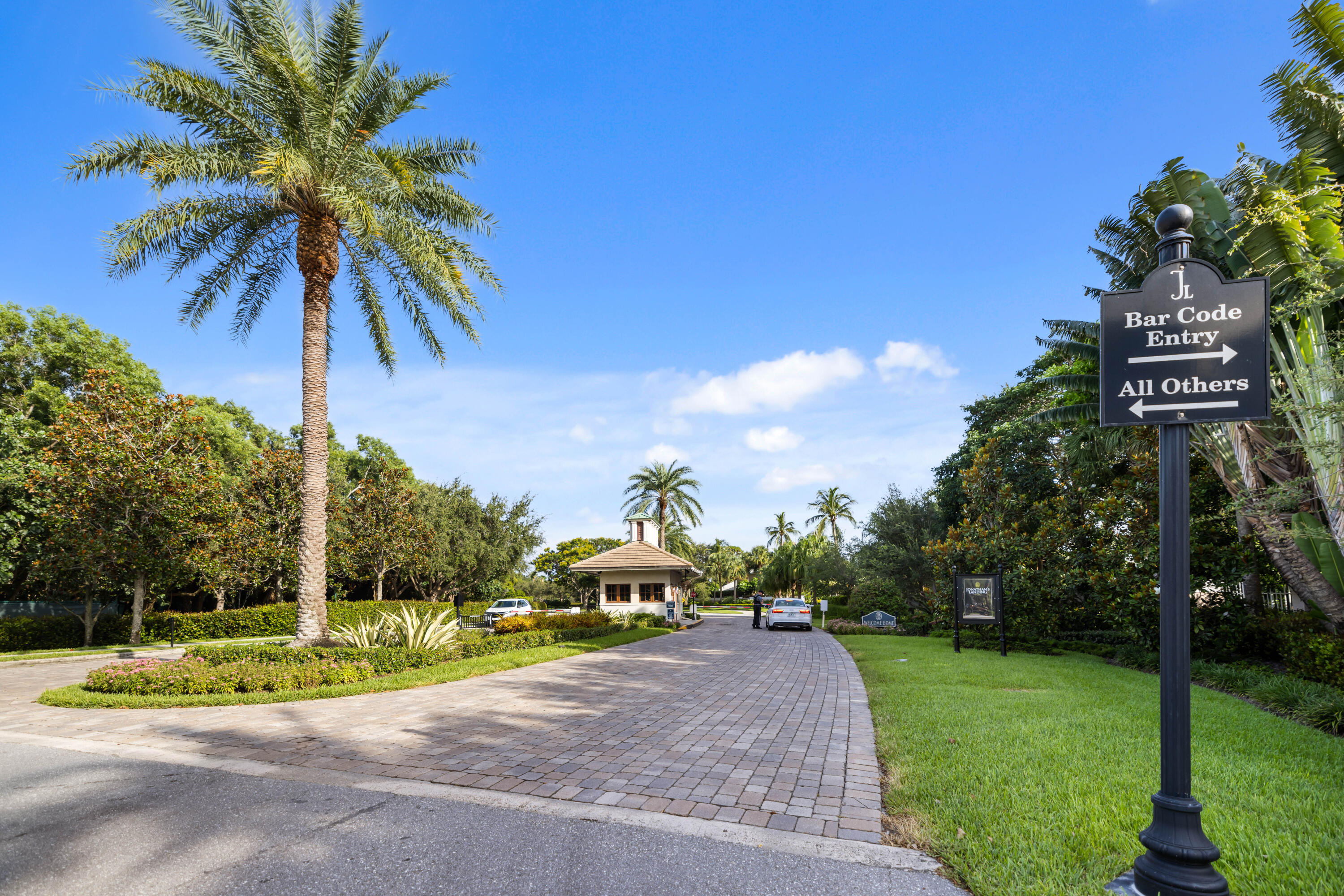 3660 Northwind Court Jupiter, FL 33477 - Photo 53 of 69 a view of a street with a building in the background