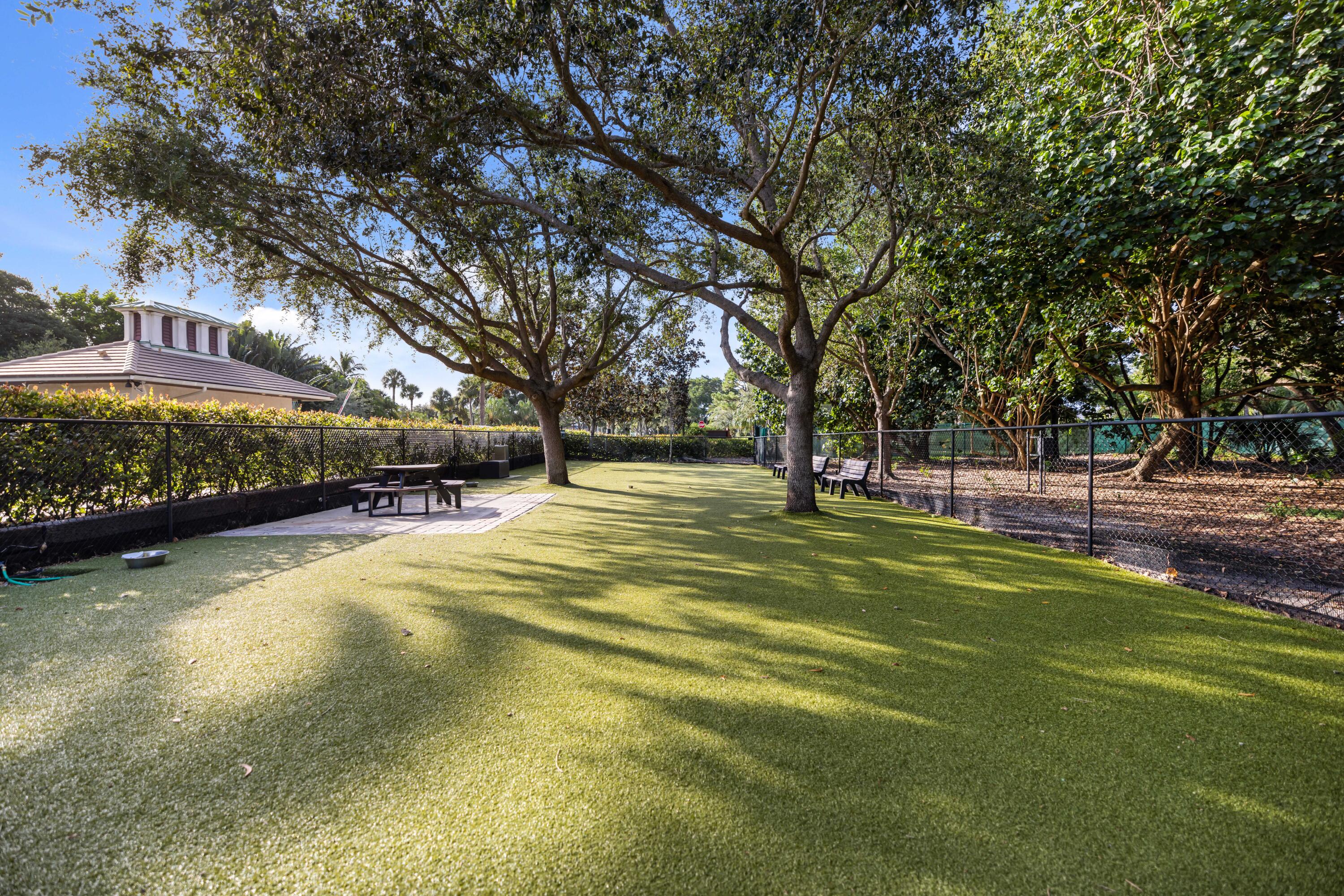 3660 Northwind Court Jupiter, FL 33477 - Photo 58 of 69 a view of a swimming pool with an outdoor space