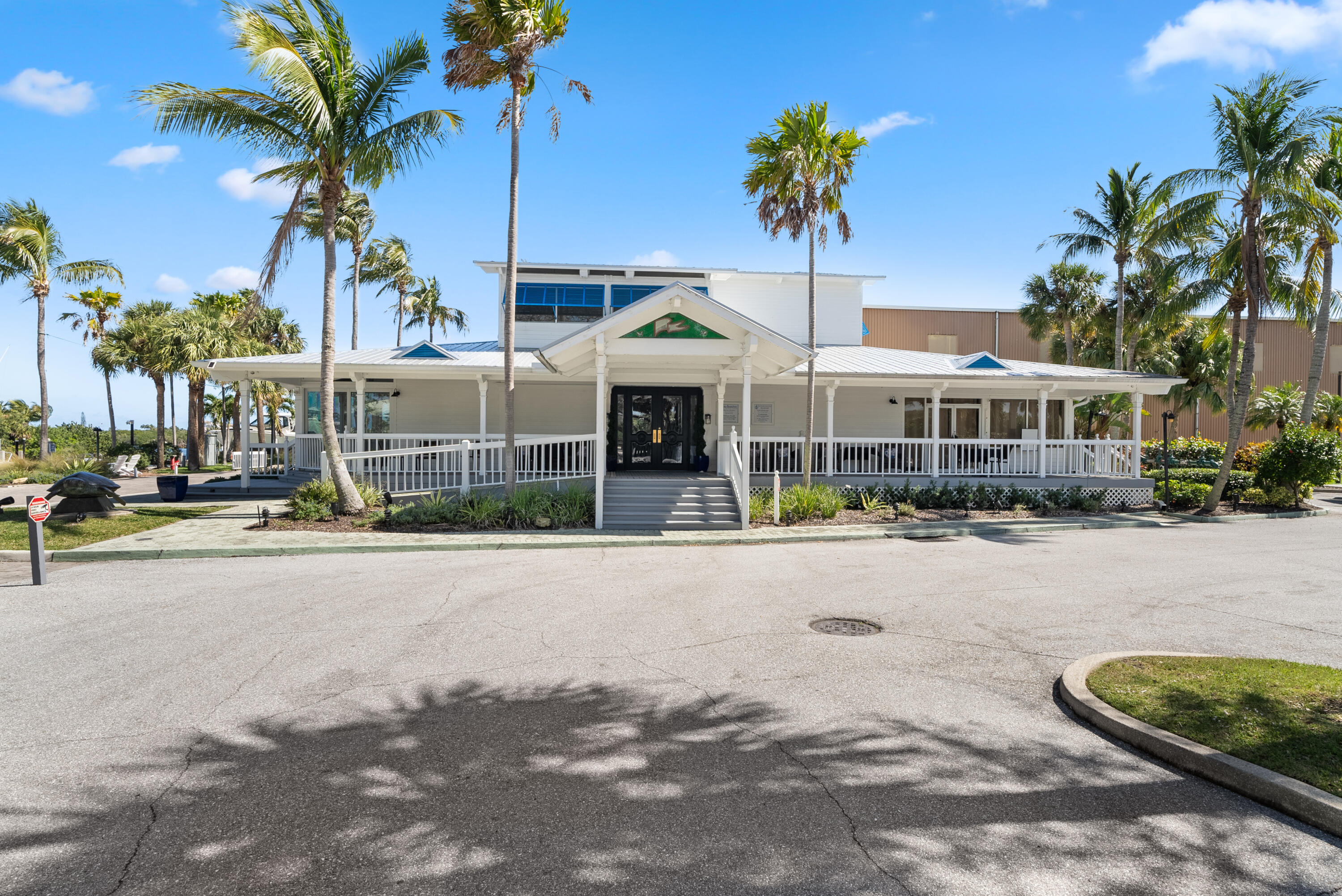 3660 Northwind Court Jupiter, FL 33477 - Photo 59 of 69 a front view of a house with street view