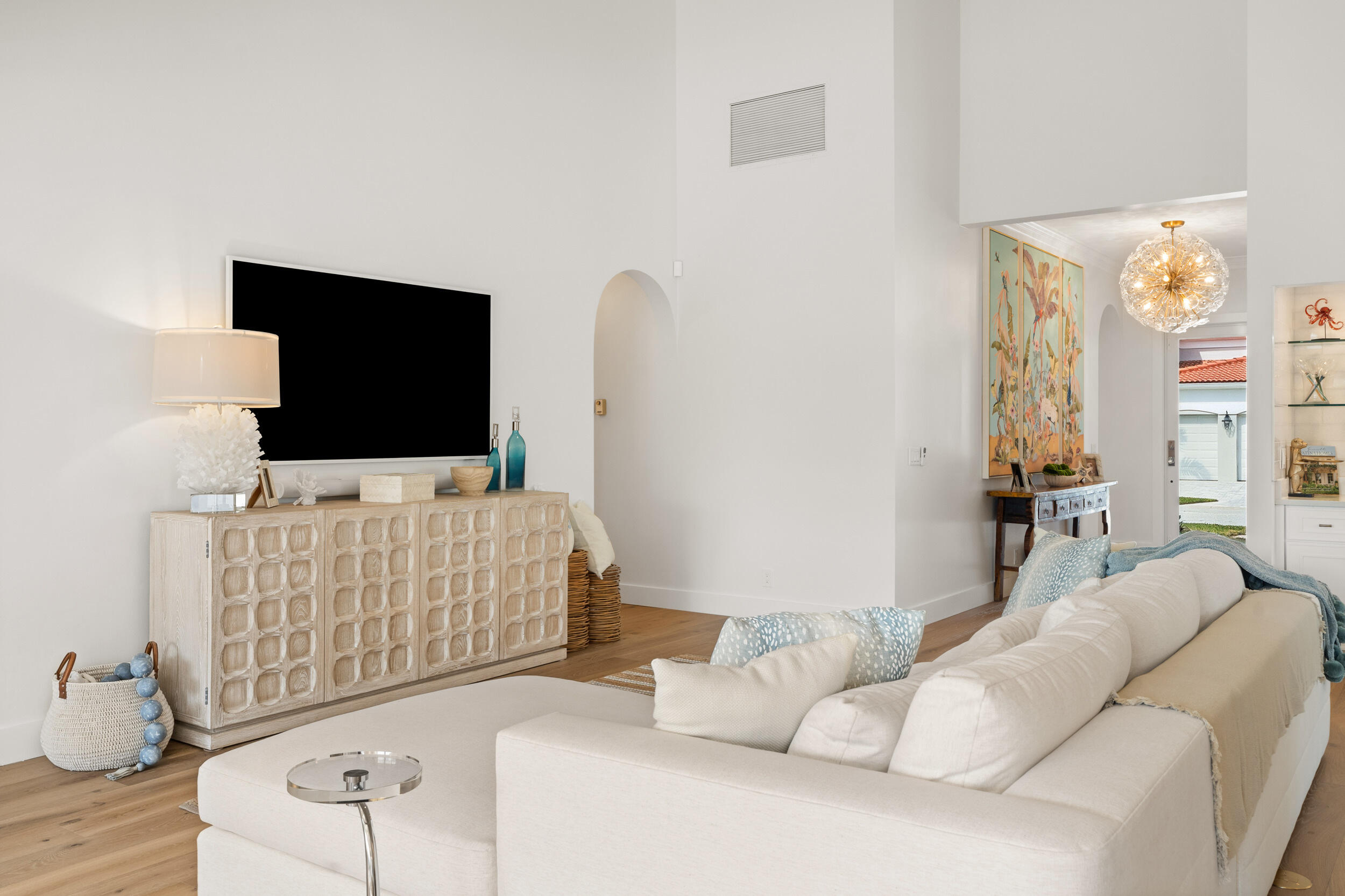 3660 Northwind Court Jupiter, FL 33477 - Photo 8 of 69 a living room with furniture and a flat screen tv