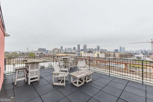 a view of a terrace with city view