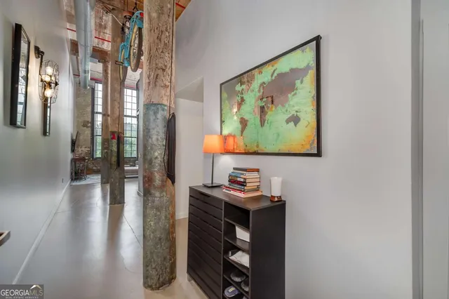 a view of a hallway with workspace