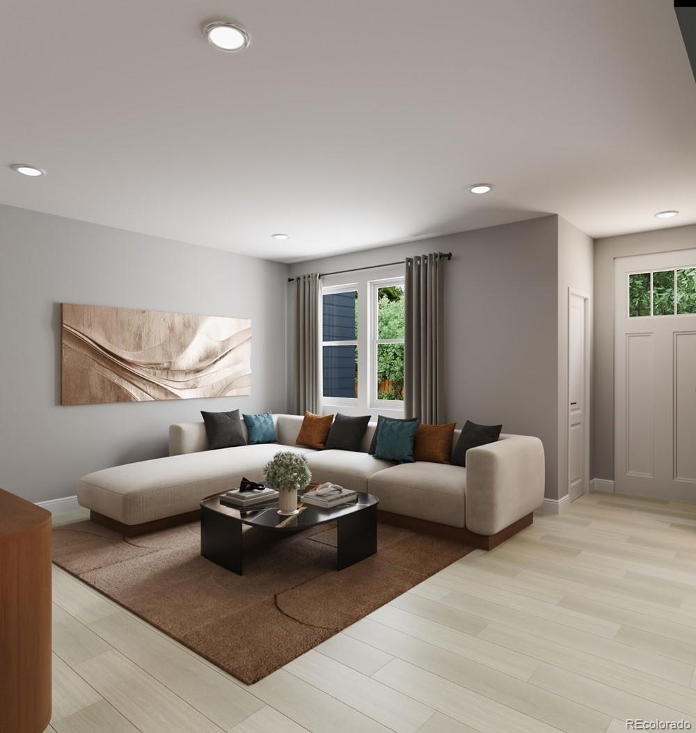 9173 Violet Way Arvada, CO 80007 - Photo 14 of 32 a living room with furniture window and a couch