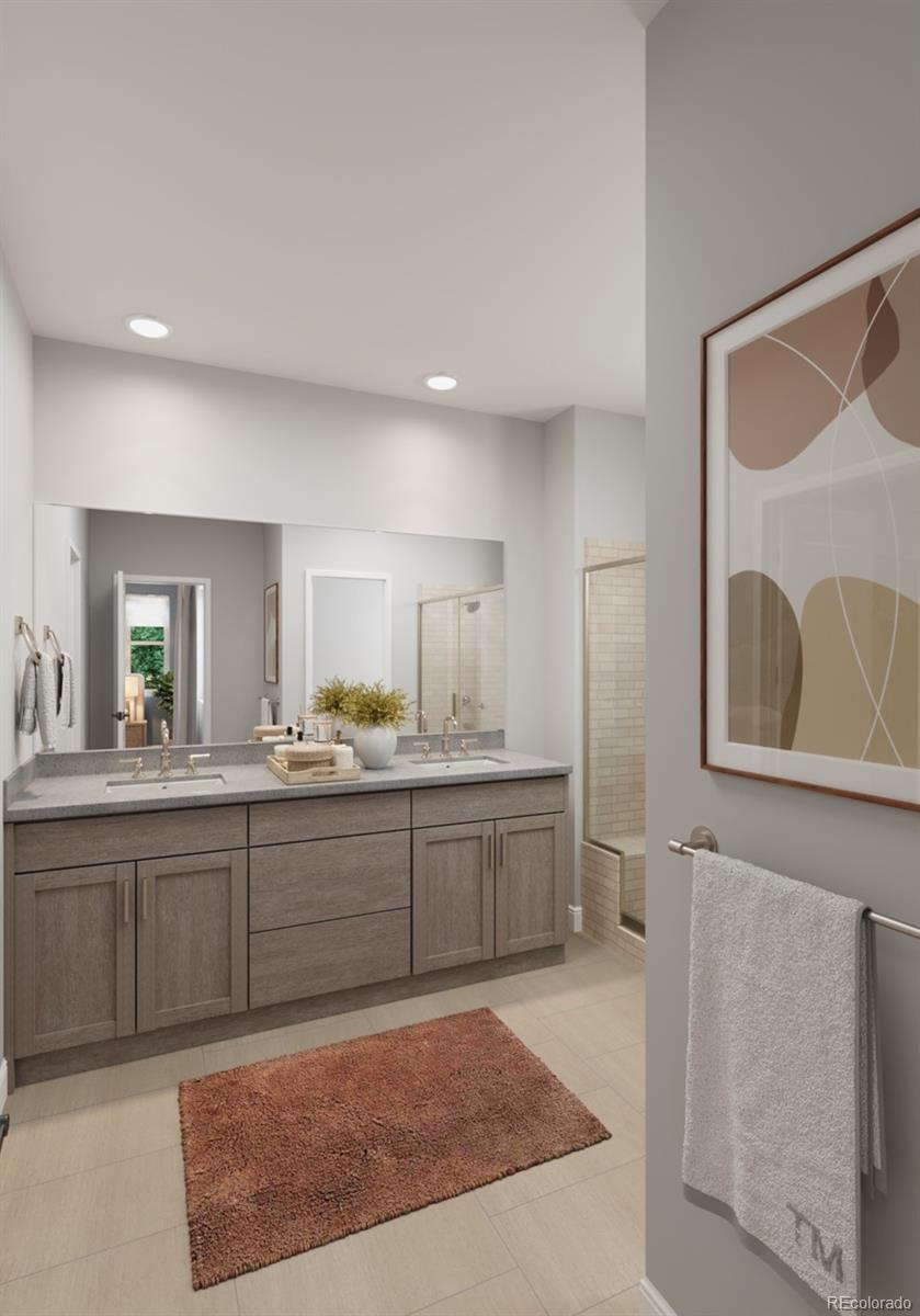 9173 Violet Way Arvada, CO 80007 - Photo 18 of 32 a bathroom with a sink and a mirror