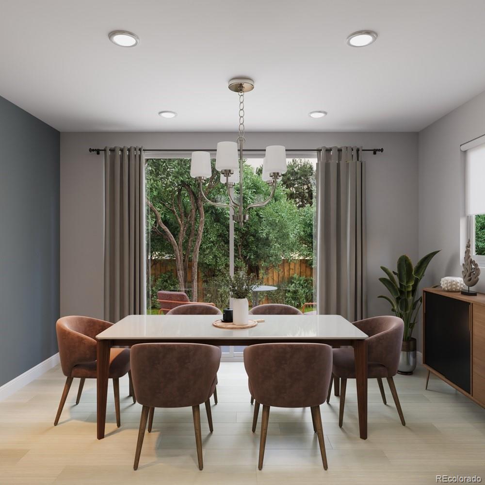 9173 Violet Way Arvada, CO 80007 - Photo 7 of 32 a view of a dining room with furniture window and outside view