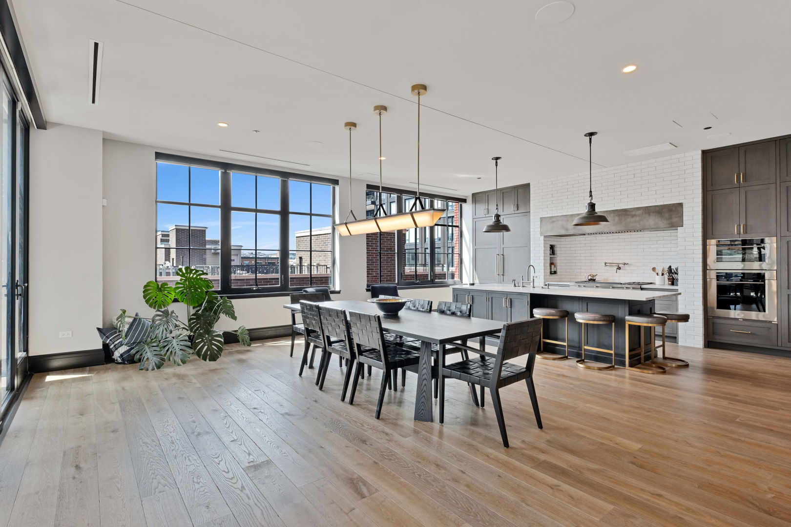 1109 West Washington Boulevard, Unit 5C Chicago, IL 60607 - Photo 12 of 31 a view of a dining room with furniture and wooden floor