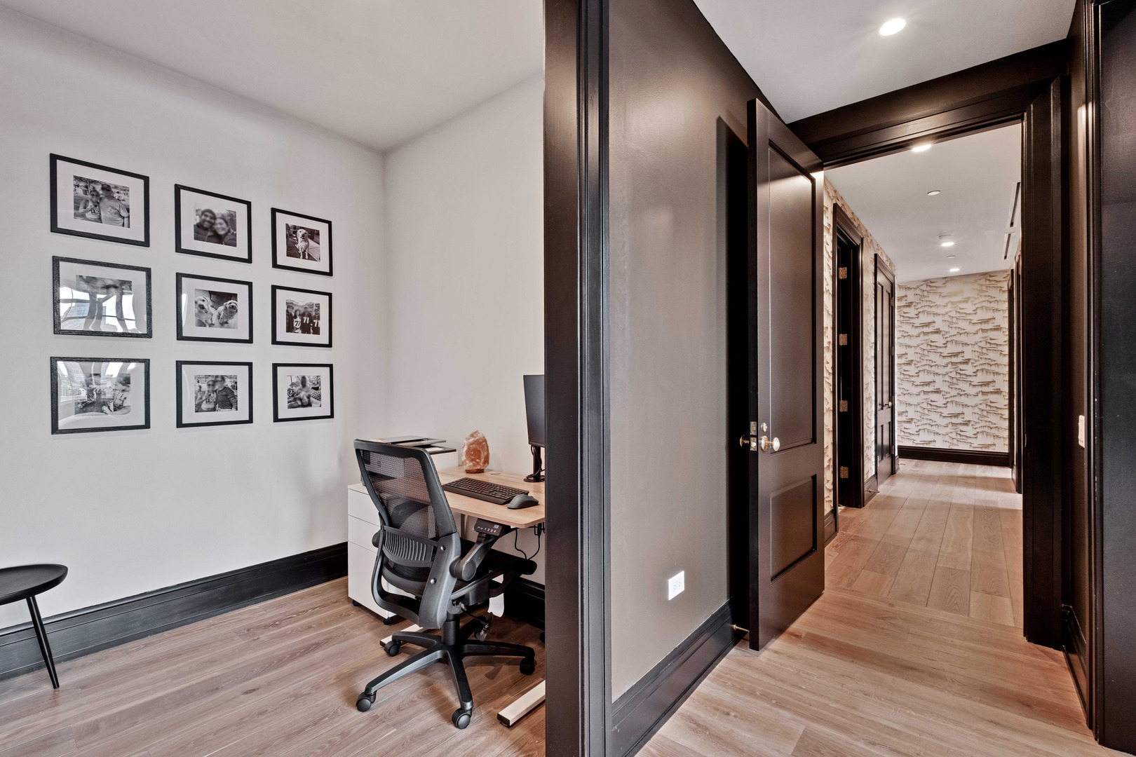 1109 West Washington Boulevard, Unit 5C Chicago, IL 60607 - Photo 24 of 31 a view of a hallway with wooden floor and windows