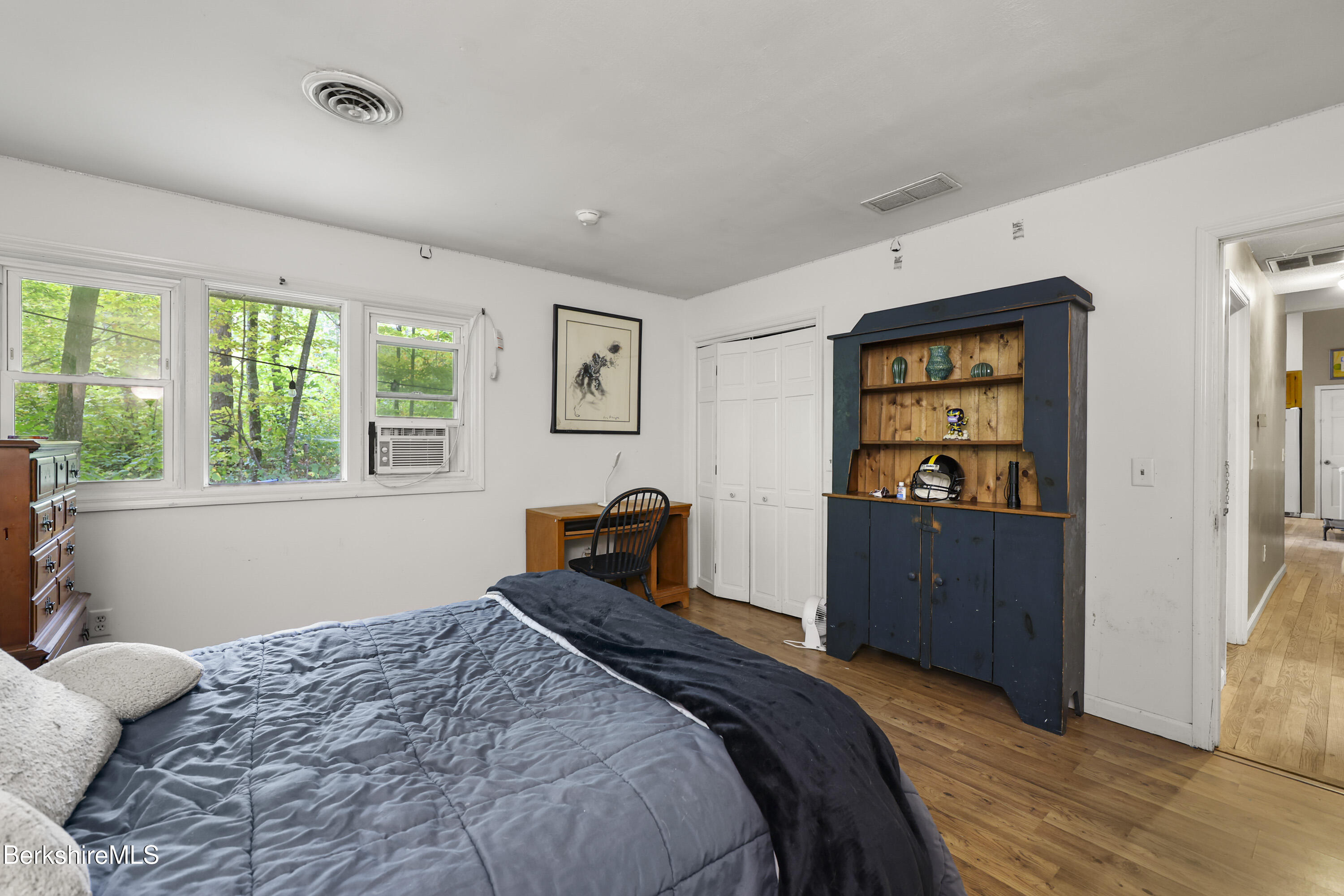 1592 County Road Sheffield, MA 01230 - Photo 19 of 32 a bedroom with a bed and a window