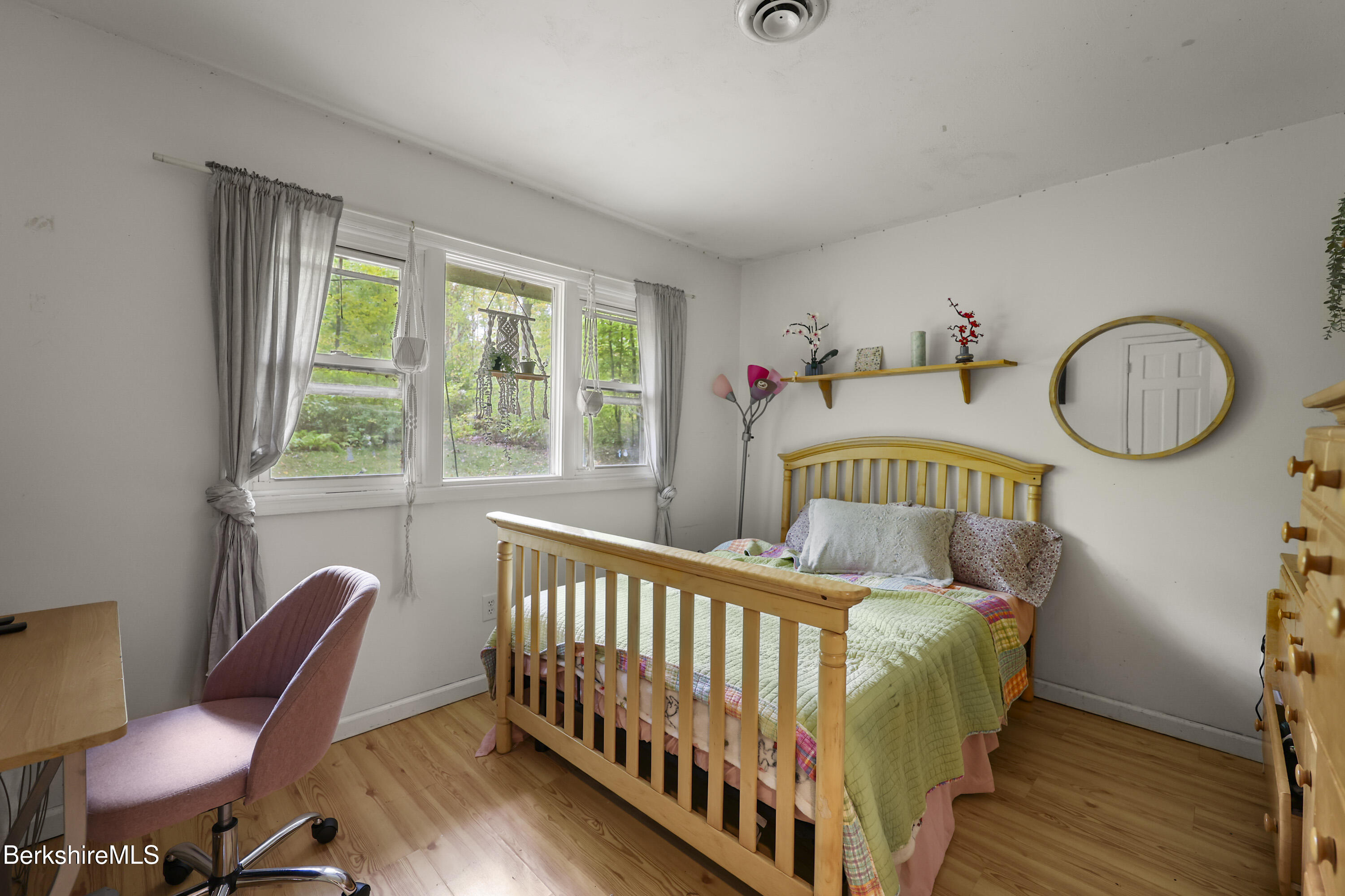 1592 County Road Sheffield, MA 01230 - Photo 21 of 32 a bedroom with furniture and a window