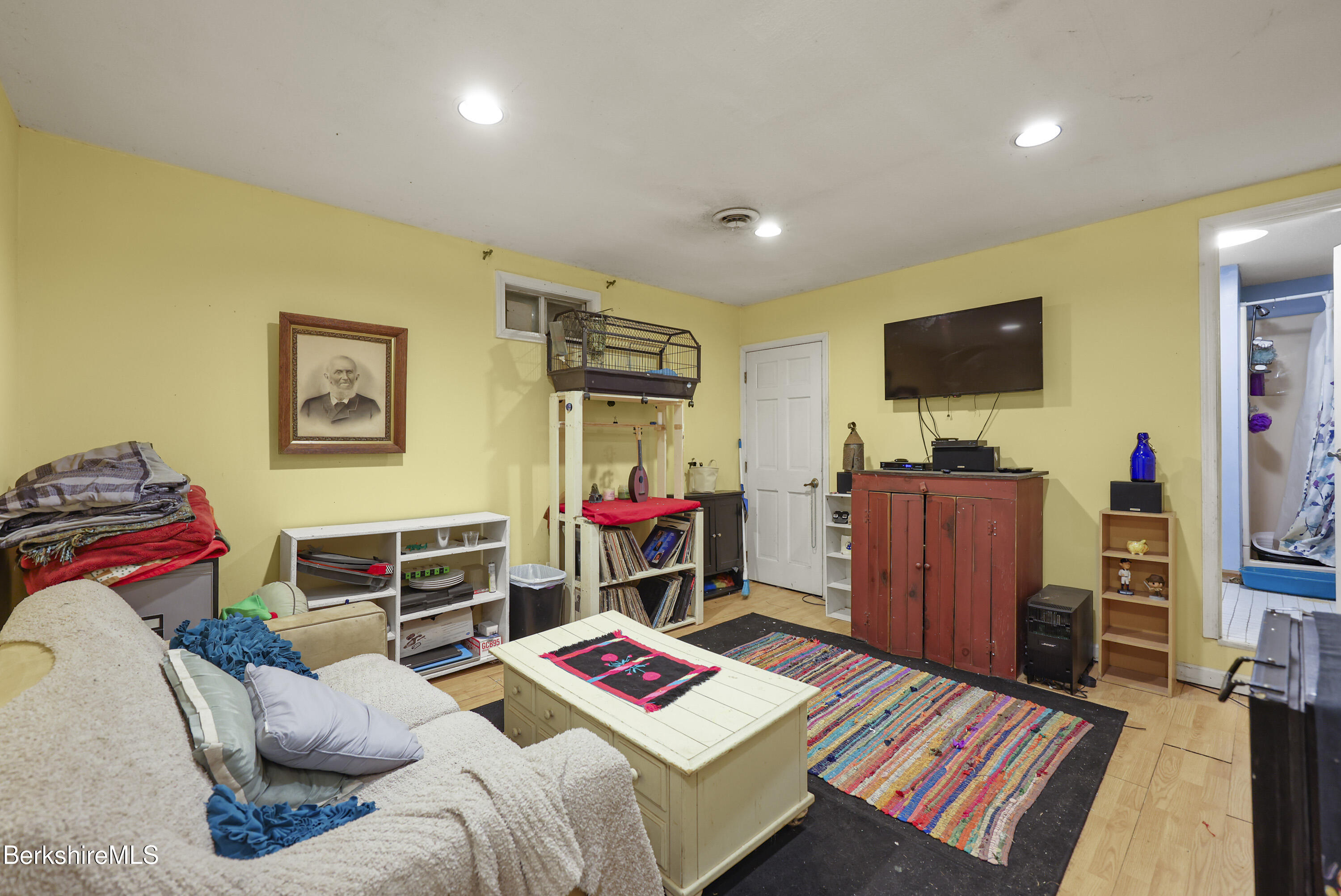 1592 County Road Sheffield, MA 01230 - Photo 24 of 32 a living room with furniture and a flat screen tv