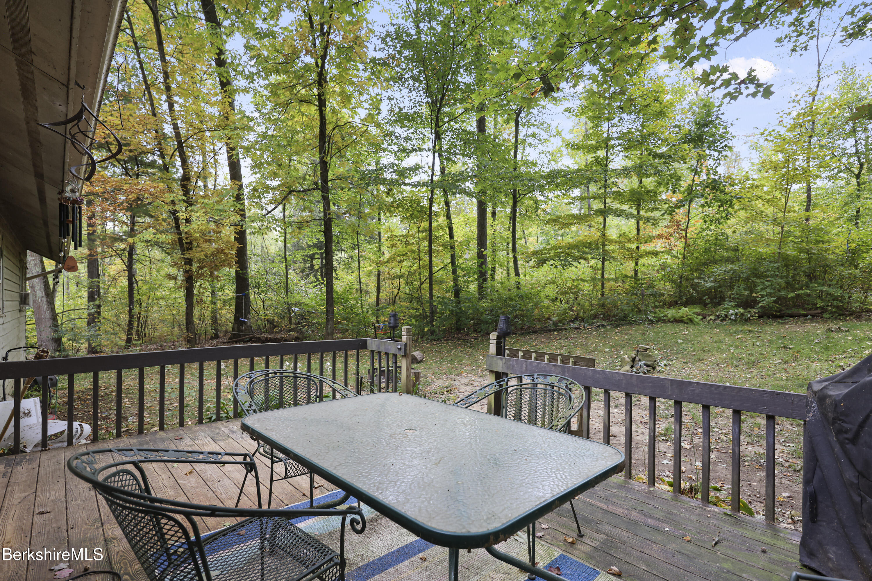 1592 County Road Sheffield, MA 01230 - Photo 30 of 32 a view of a chairs and table on the deck