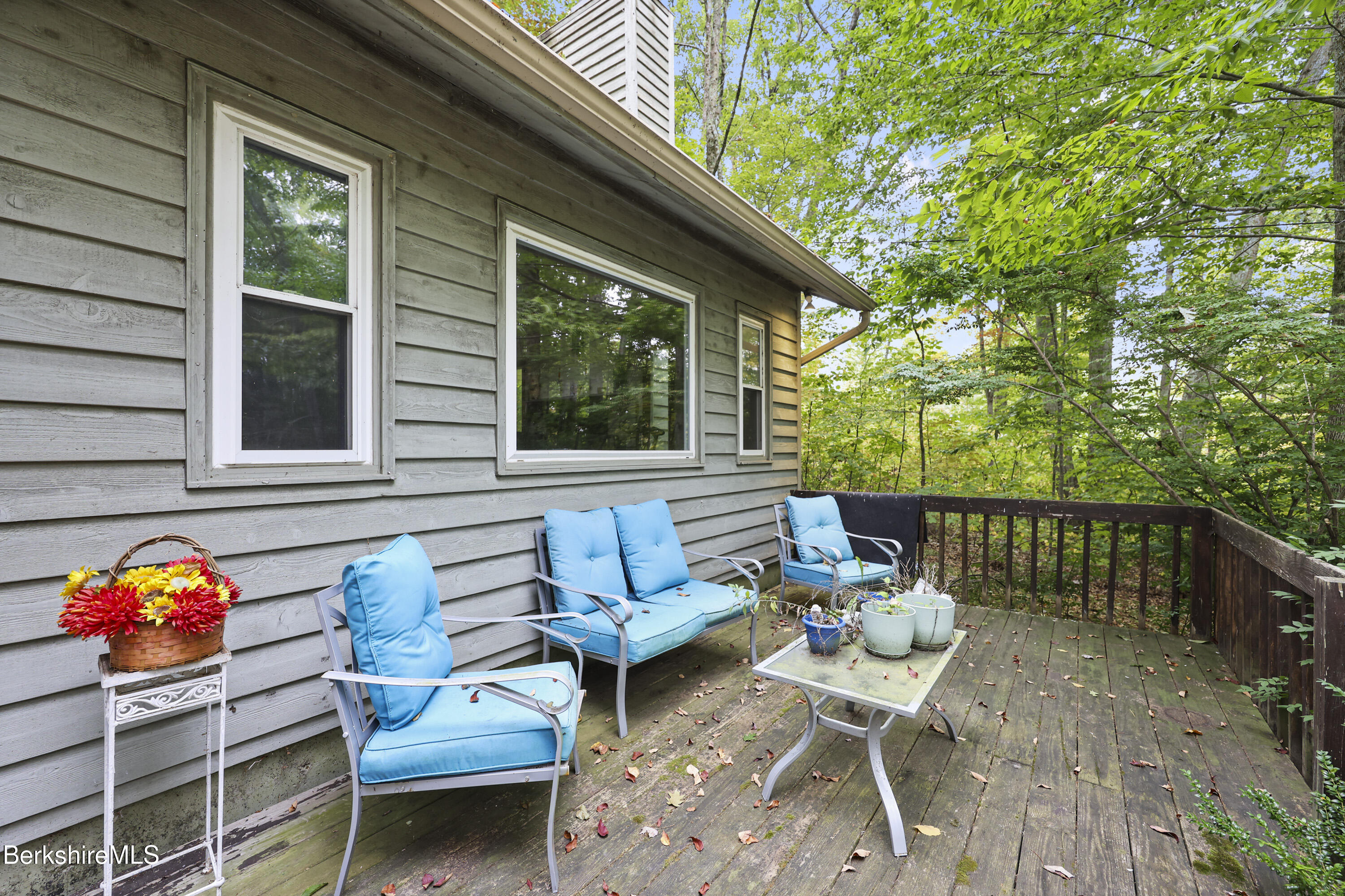 1592 County Road Sheffield, MA 01230 - Photo 3 of 32 a backyard of a house with outdoor seating