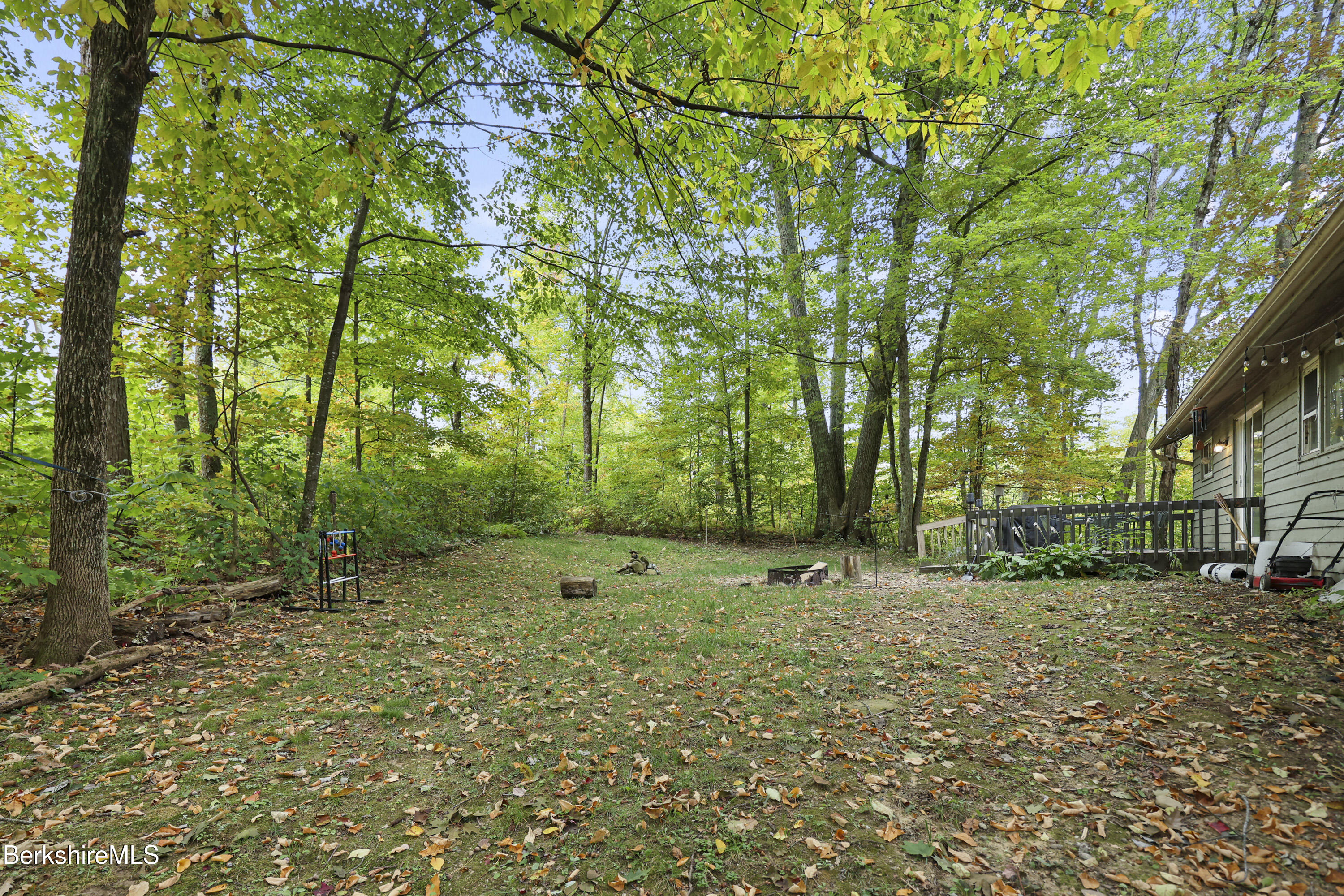 1592 County Road Sheffield, MA 01230 - Photo 32 of 32 a backyard of a house with lots of green space