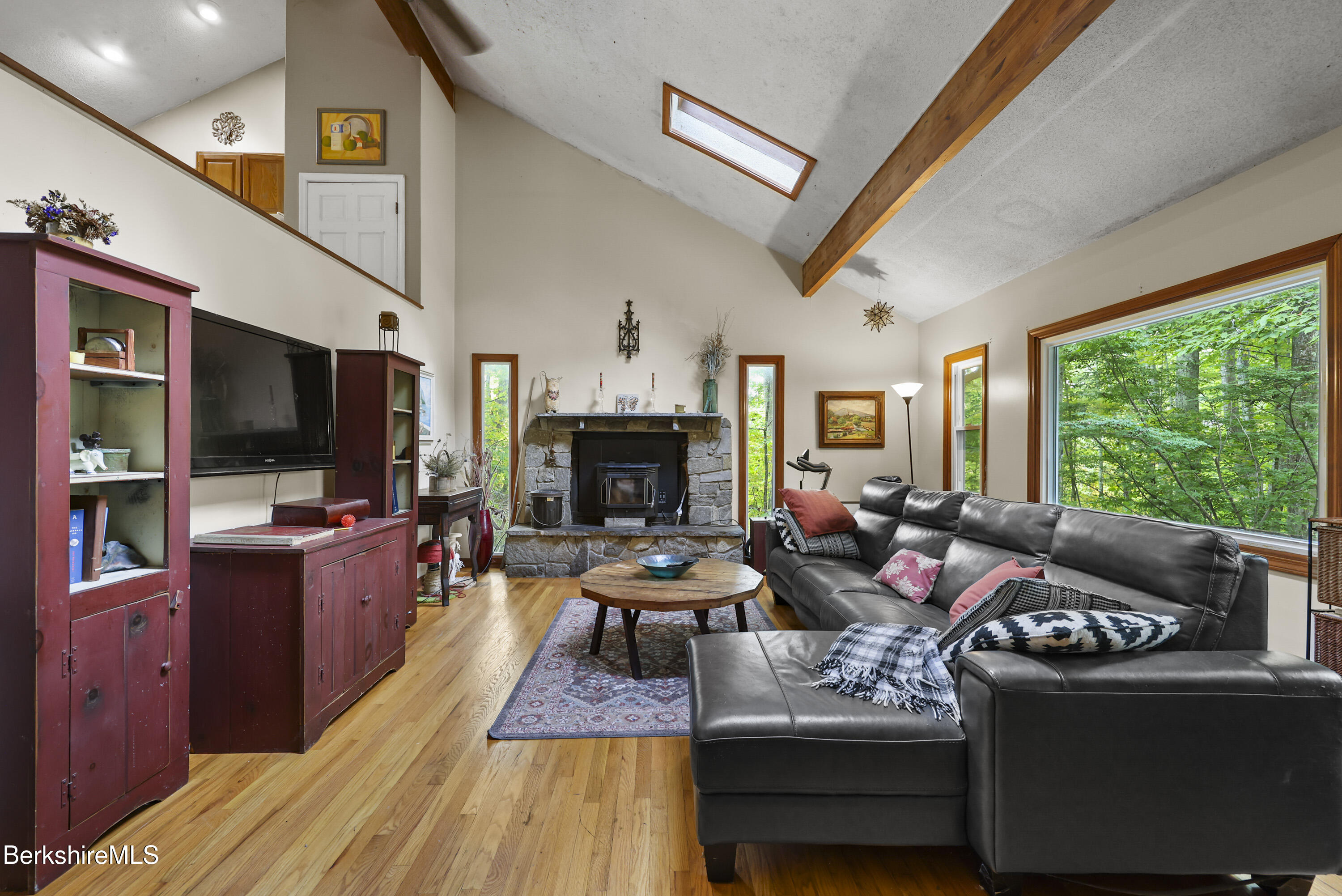 1592 County Road Sheffield, MA 01230 - Photo 5 of 32 a living room with furniture fireplace and a flat screen tv