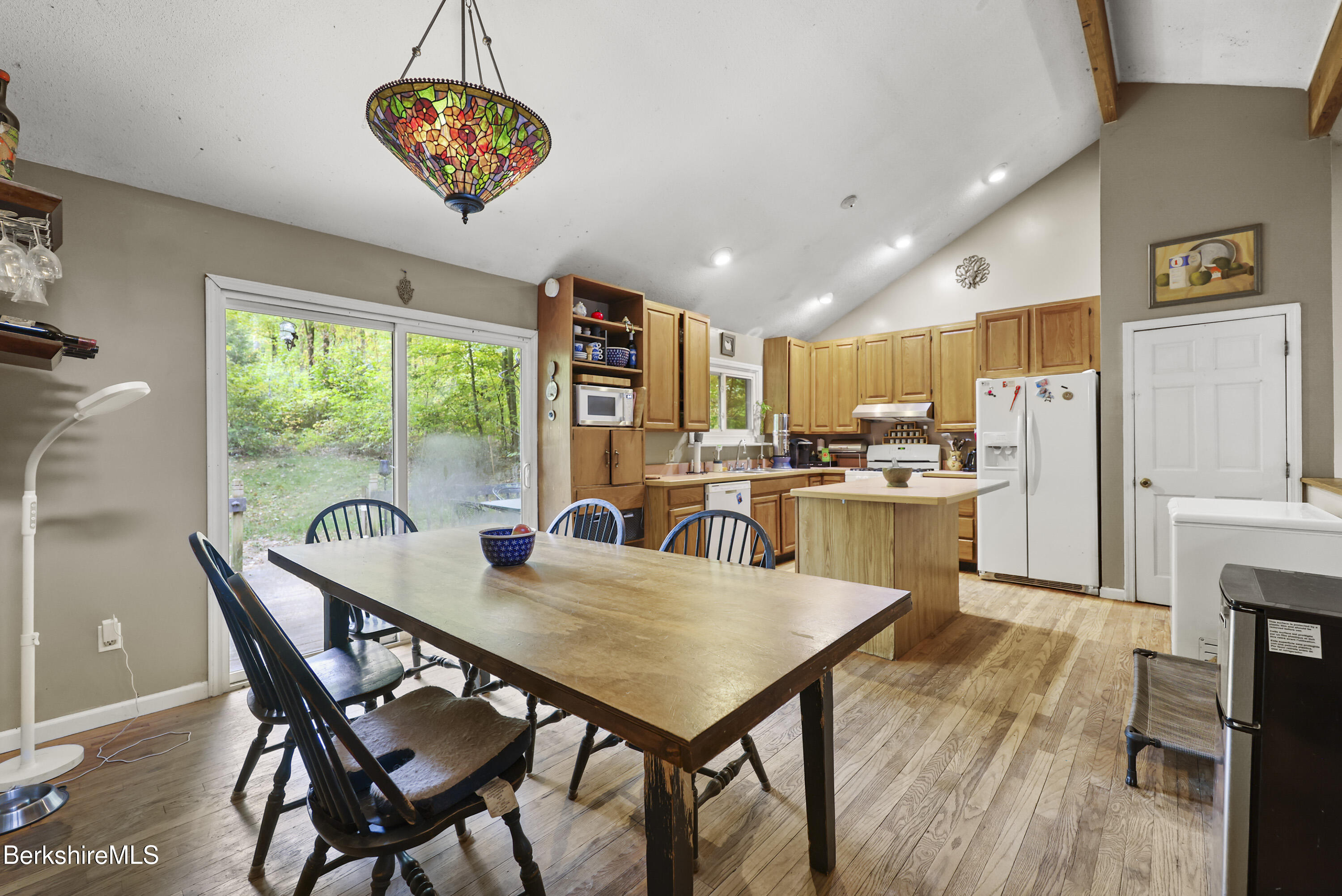 1592 County Road Sheffield, MA 01230 - Photo 10 of 32 a view of a dining room with furniture window and wooden floor