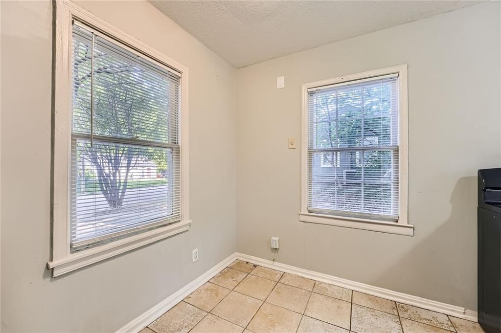 2275 Old Spring Road Smyrna, GA 30080 - Photo 15 of 28 a view of an empty room with a window