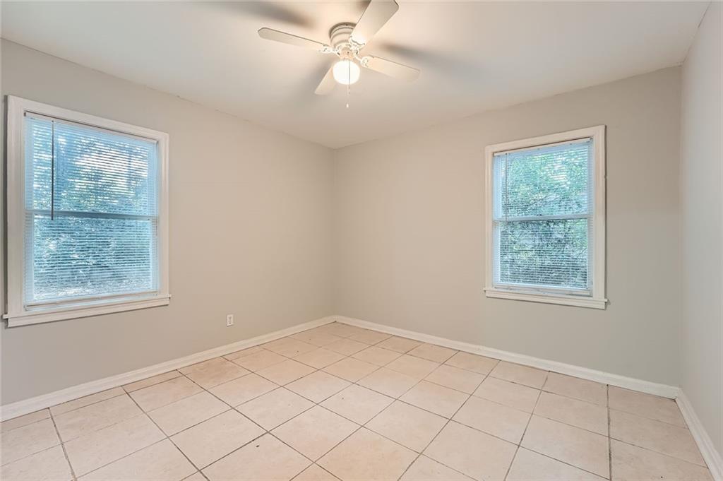 2275 Old Spring Road Smyrna, GA 30080 - Photo 16 of 28 a view of an empty room with a window