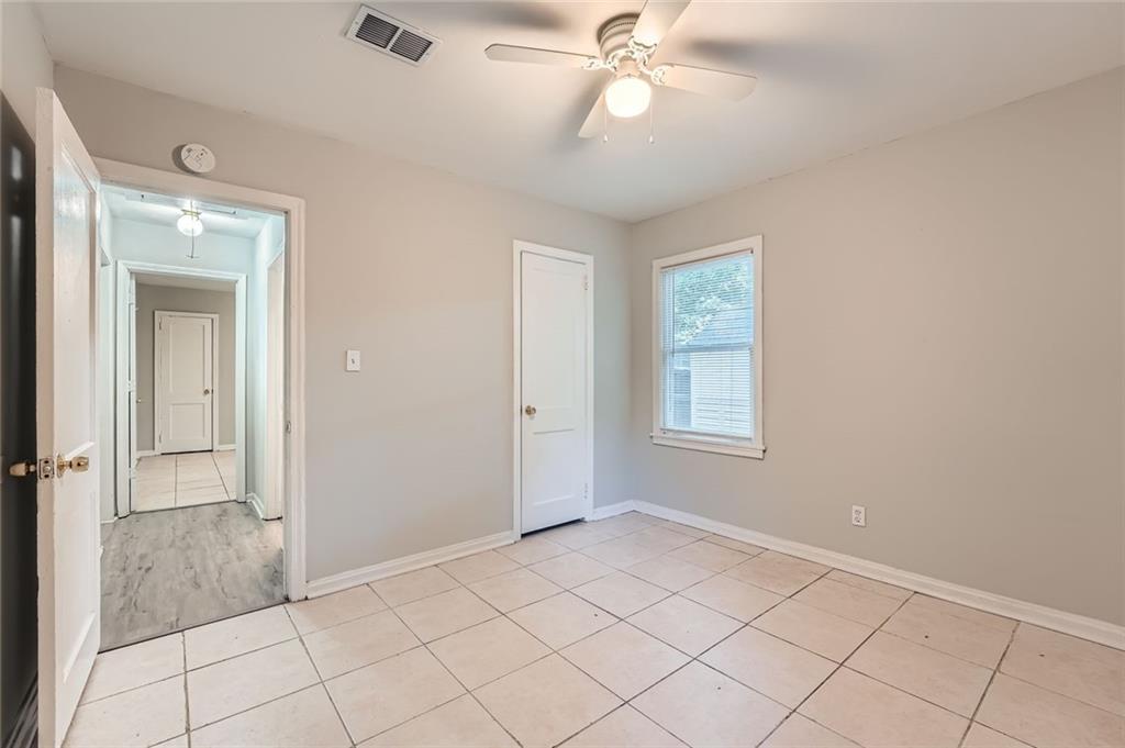 2275 Old Spring Road Smyrna, GA 30080 - Photo 18 of 28 a view of an empty room and window