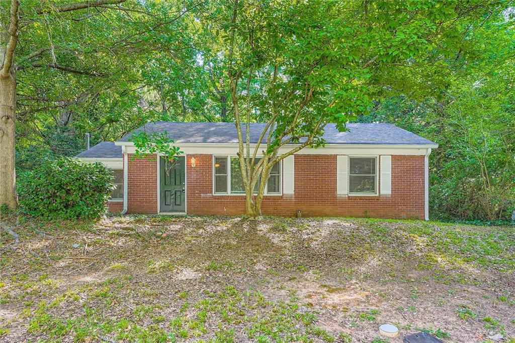 2275 Old Spring Road Smyrna, GA 30080 - Photo 2 of 28 front view of a house with a yard