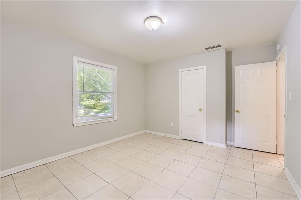 2275 Old Spring Road Smyrna, GA 30080 - Photo 23 of 28 an empty room with windows