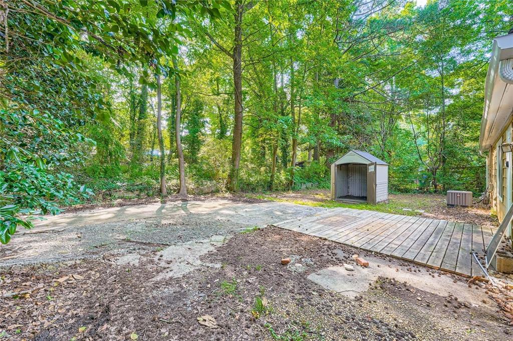 2275 Old Spring Road Smyrna, GA 30080 - Photo 26 of 28 a front view of a house with a garden
