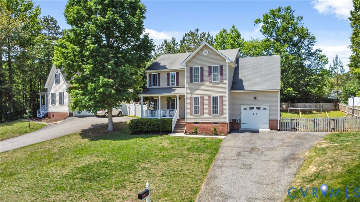 3218 Rimswell Court Midlothian, VA 23112 - Photo 1 of 32 Colonial house featuring covered porch, asphalt dr