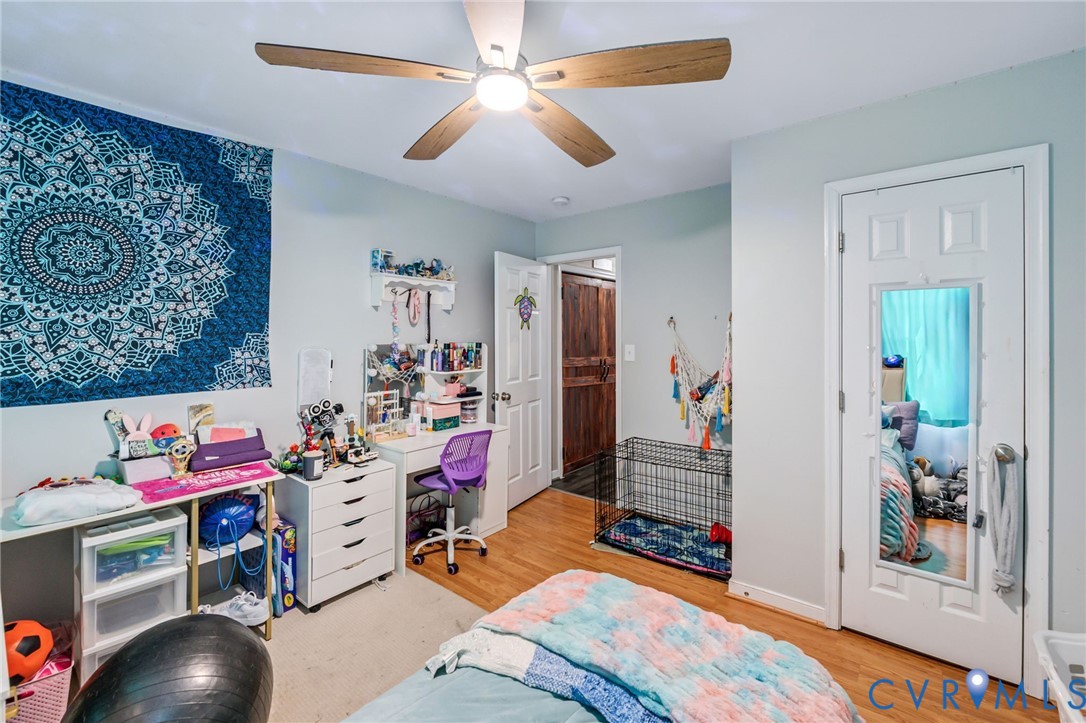 3218 Rimswell Court Midlothian, VA 23112 - Photo 20 of 32 Bedroom with wood finished floors, a ceiling fan,