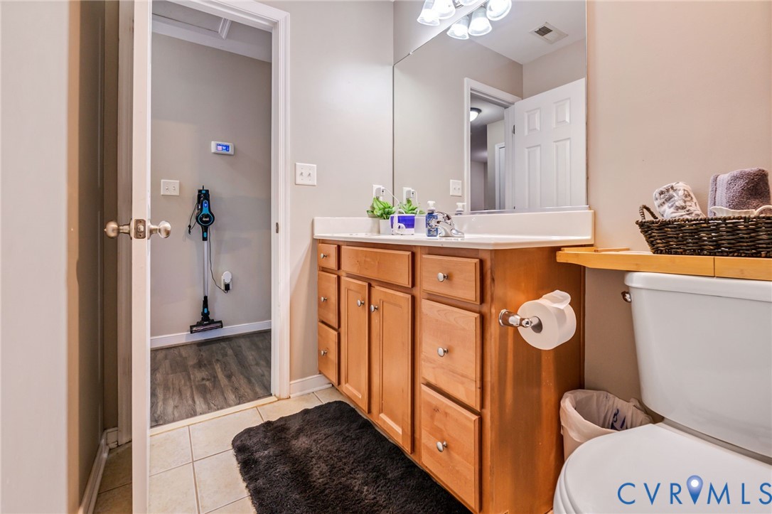 3218 Rimswell Court Midlothian, VA 23112 - Photo 25 of 32 Bathroom with tile patterned floors, vanity, toile