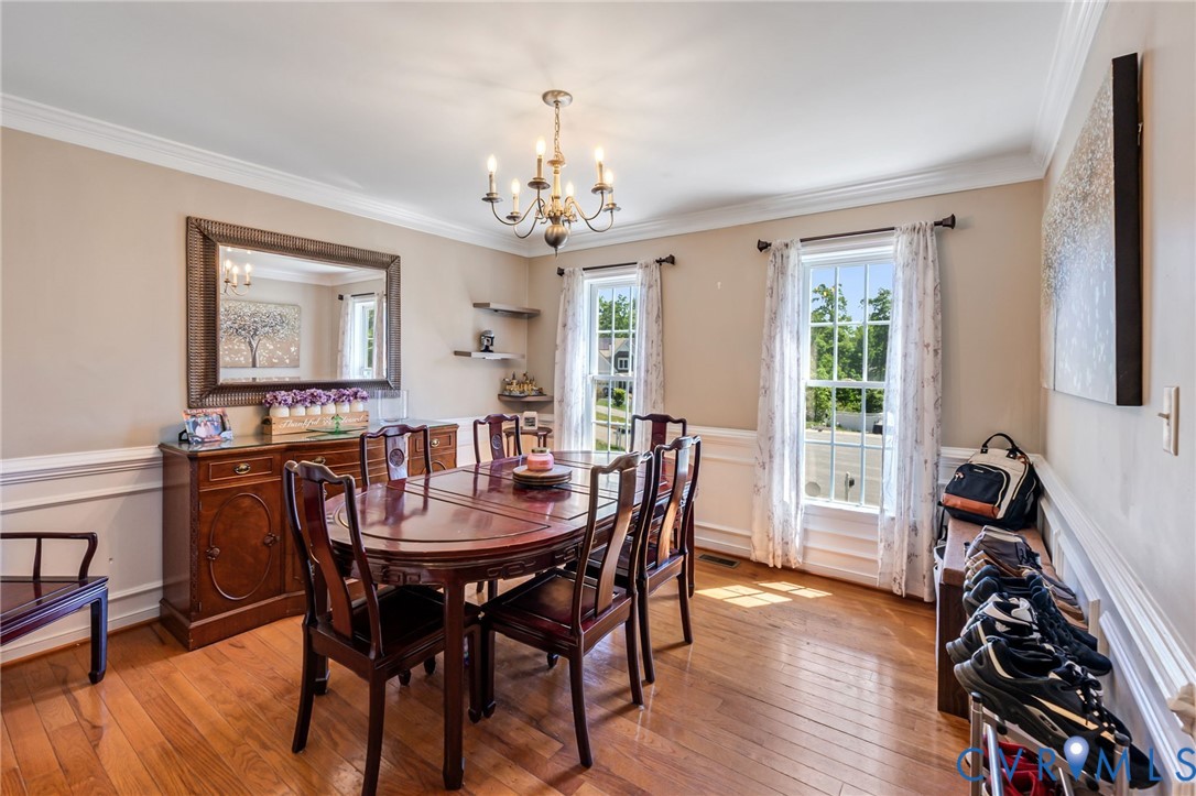 3218 Rimswell Court Midlothian, VA 23112 - Photo 4 of 32 Dining space with a chandelier, crown molding, and