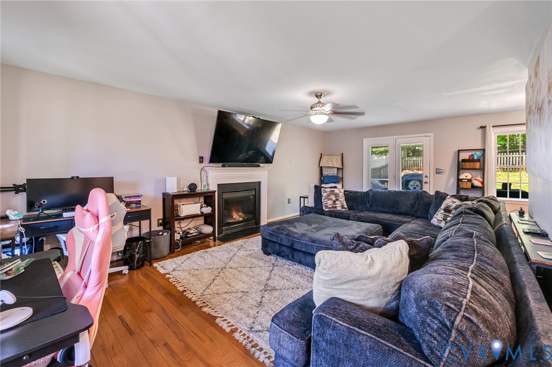 3218 Rimswell Court Midlothian, VA 23112 - Photo 6 of 32 Living area with a ceiling fan, wood finished floo
