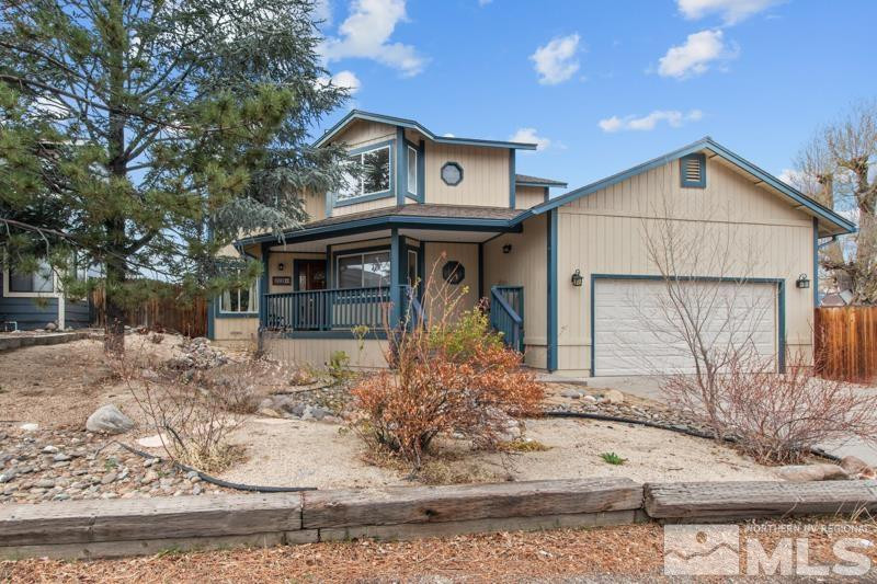 3920 West 7th Street Reno, NV 89503 - Photo 1 of 20 a front view of a house with garden