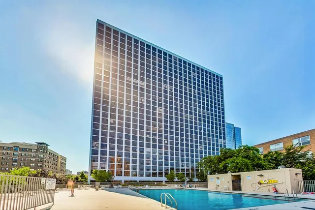 a view of building with yard