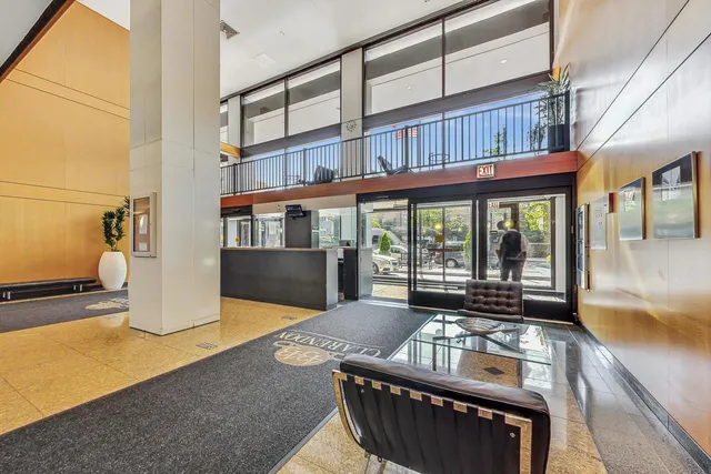 a view of an chairs and table in the balcony