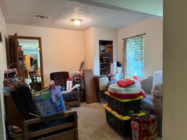 235 Connell Road Vidor, TX 77662 - Photo 26 of 35 a living room with furniture and a rug