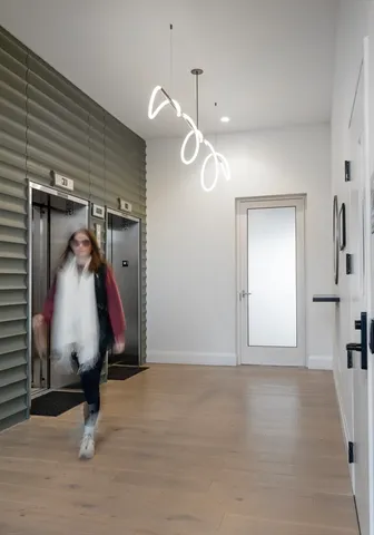 a view of a door and a mirror