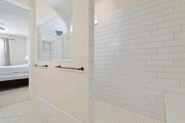 a bathroom with a white bathtub