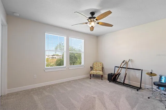 a view of livingroom with furniture and windows