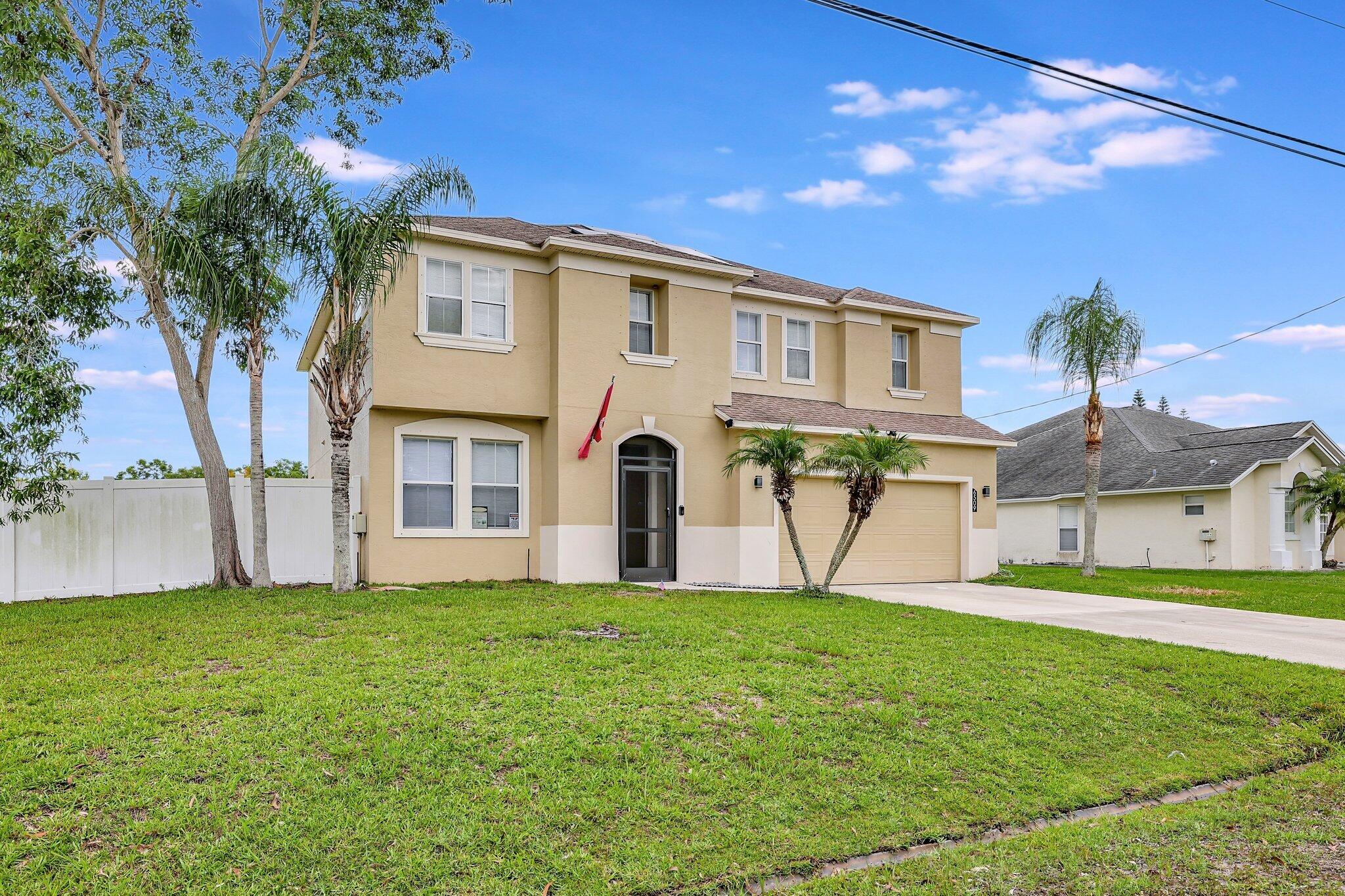 6509 Northwest Omega Road Port St. Lucie, FL 34983 - Photo 3 of 58 Front of Structure