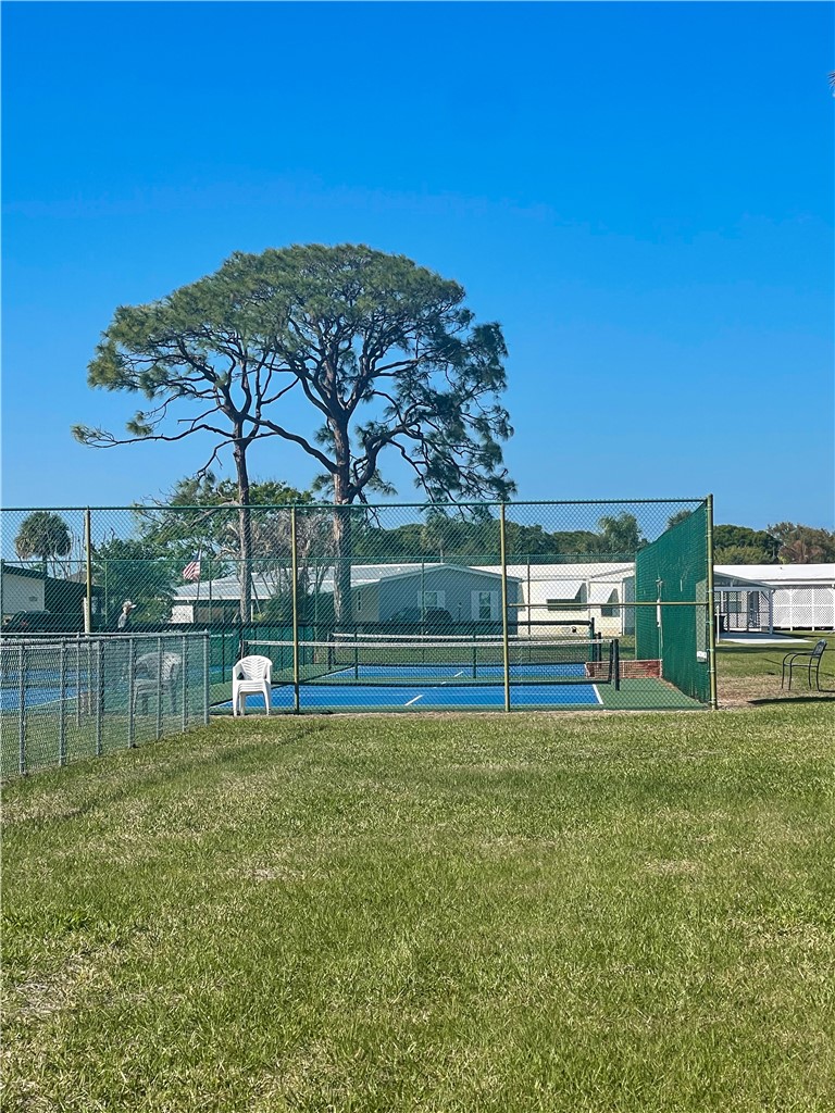 7635 Blackhawk Road Micco, FL 32976 - Photo 25 of 30 a view of a lake with houses