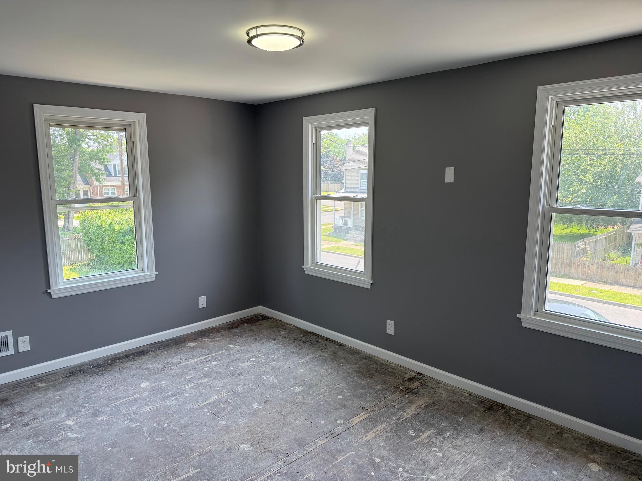 57 Pine Street Beverly, NJ 08010 - Photo 6 of 9 a view of an empty room with a window