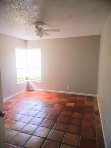 a bathroom with a shower and a toilet