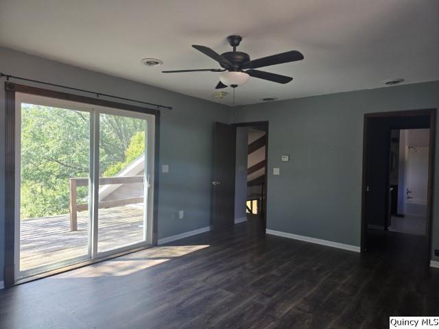 1797 East Co Road 1540 Carthage, IL 62321 - Photo 13 of 36 a view of empty room with wooden floor and fan