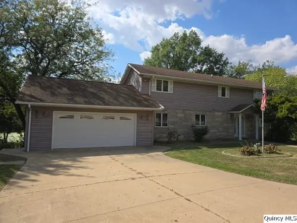 front view of a house with a patio