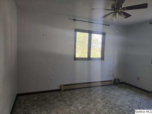 1797 East Co Road 1540 Carthage, IL 62321 - Photo 7 of 36 an empty room with a window