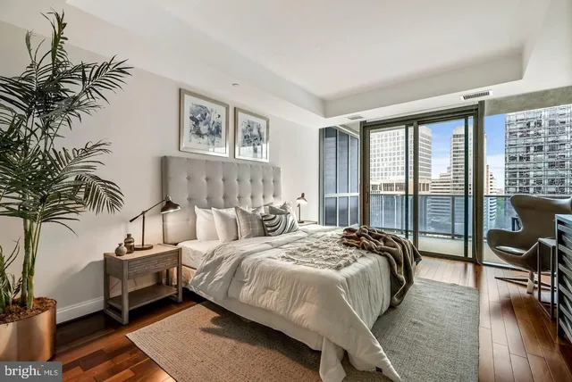 a bed room with a bed and a couch