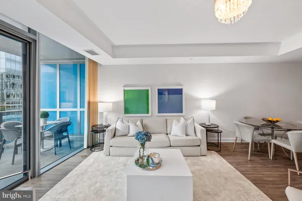 a living room with furniture and a table